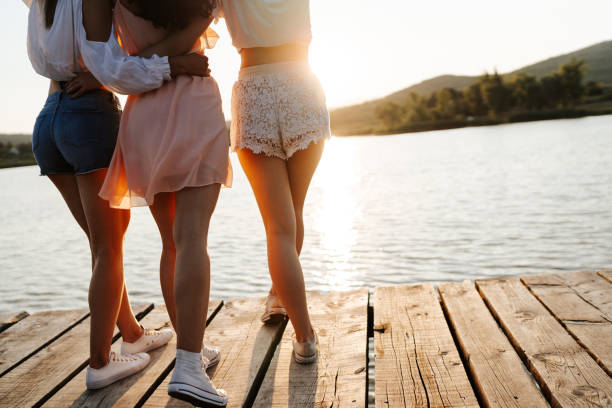 istock Best friends enjoying the sunset 1328808193