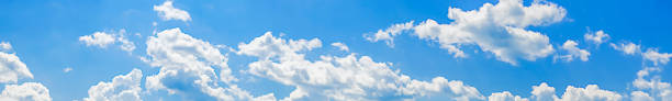 istock Beautiful background of blue sky with cumulus white clouds.Panorama 1328809020
