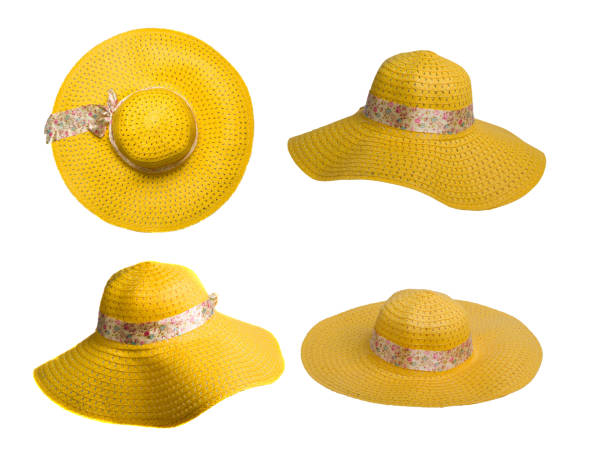 straw hat flying through the air in front of a clear blue sky, summer background with flares