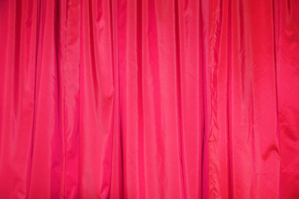 istock pink draped curtains close up texture for textile background 1328809794