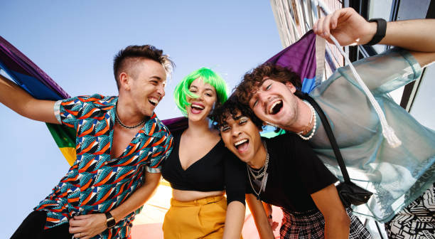 istock Four young people celebrating their queer identities together 1328812864
