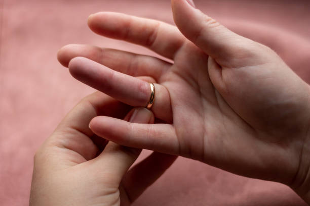 istock girl can not remove wedding ring close-up 1328815189