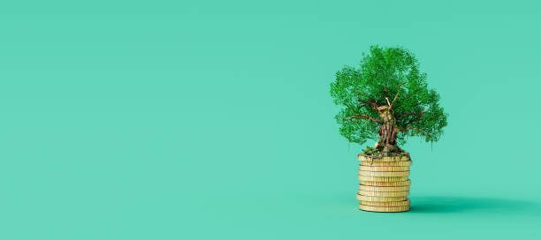 istock Gold coins stack with growing tree on green background. Stable business concept 1328815209