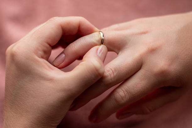 istock girl can't take off her wedding ring 1328815220