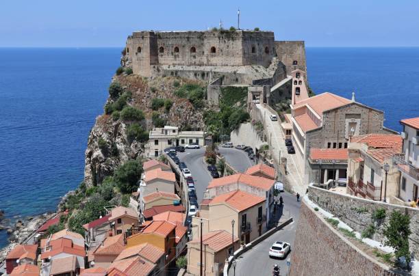 Scilla - Castello Ruffo from the Belvedere Staircase Scilla, Calabria, Italy - June 13, 2021: Fortification dating back to the 5th century BC, transformed into a baronial residence by the Ruffo family in 1533, acquired to state property in 1808 and renovated in the 20th century castle scilla stock pictures, royalty-free photos & images