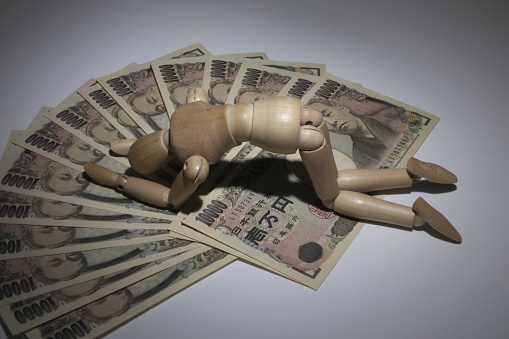 Money and depressed drawing dolls