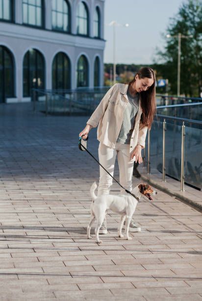 istock beautiful woman with a dog 1328821152