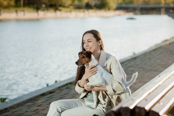 istock a happy girl hugs her dog 1328821218