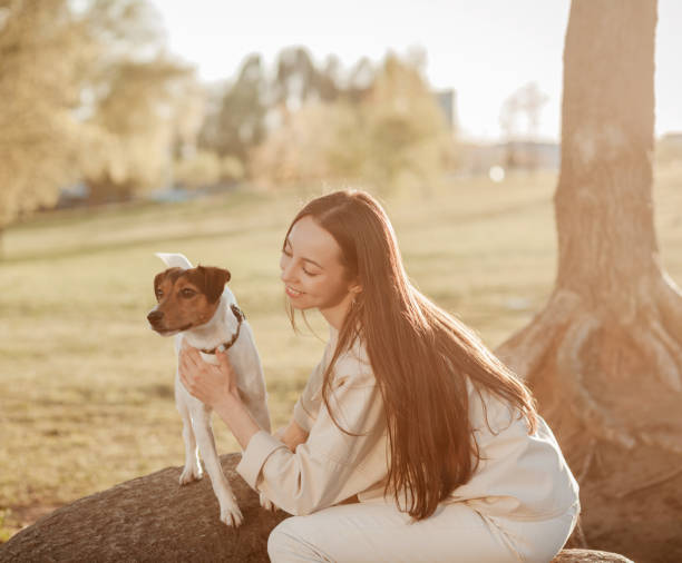 istock happy girl with a dog 1328821260
