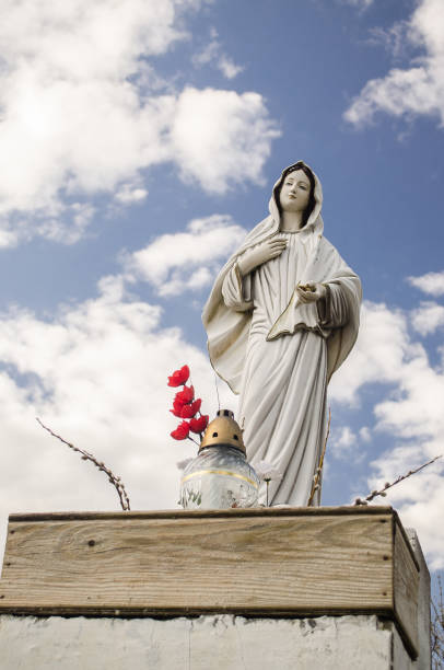 istock Statue of virgin Maria in Lenas, Latvia 1328824383