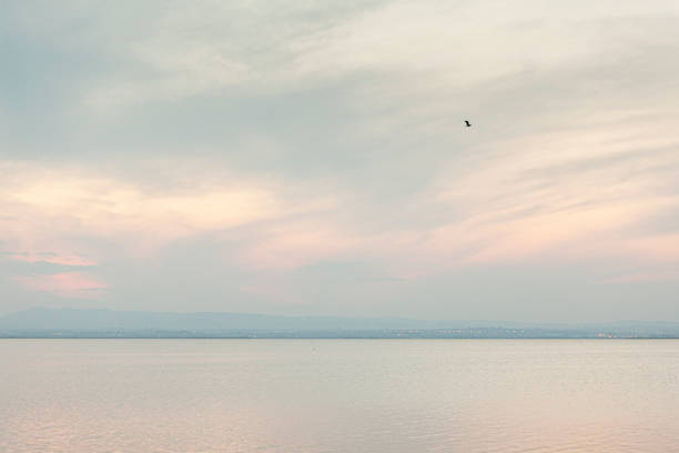 lake with reflections in the water at sunset