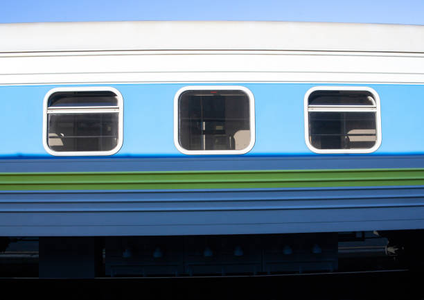 istock Train at the train station. Windows in passenger coach. Railway carriage. 1328830299