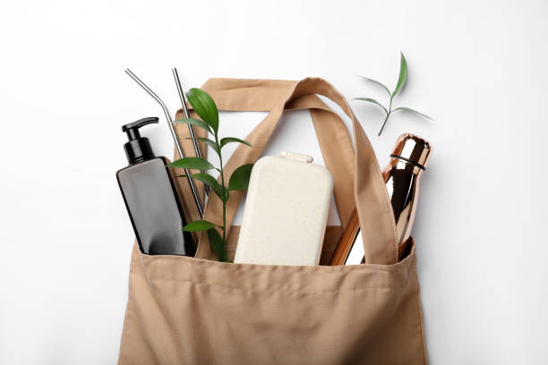 istock Bag with eco friendly products on white background, top view 1328831222