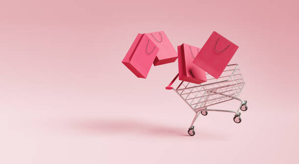 istock shopping cart with bags 1328831333