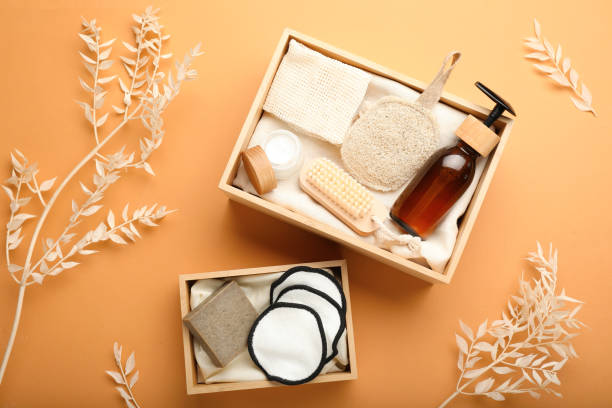 istock Eco friendly products in crates on pale orange background, flat lay 1328831608