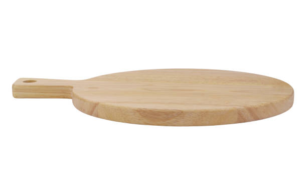 istock Wooden pizza cutting board isolated on white 1328835321