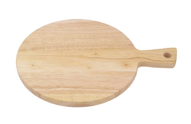 istock Wooden pizza cutting board isolated on white 1328835409
