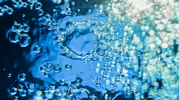 istock Bubbles on the surface of blue water 1328838085