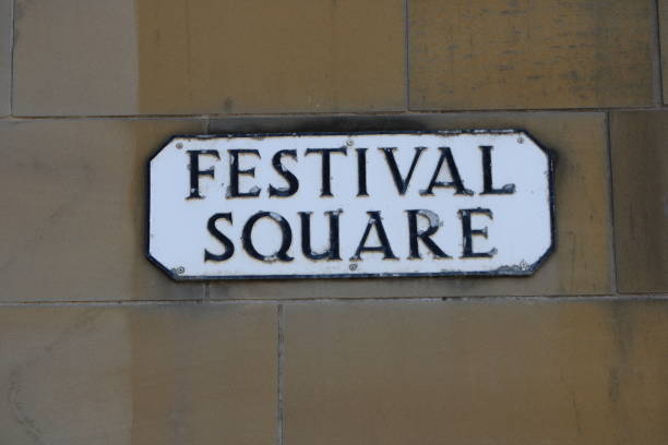 istock Festival Square Street Name Sign 1328839640