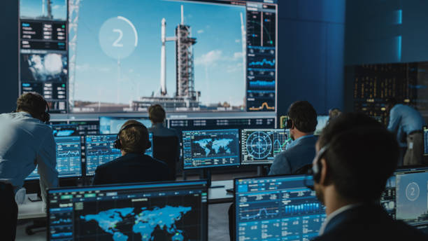group-of-people-in-mission-control-center-counts-down-the-seconds-before-space-rocket-launch.jpg?s=612x612&w=0&k=20&c=DAcauKWMCbl0sr1v-UASrhUQMMMfc_3LkzUOuckmDic=