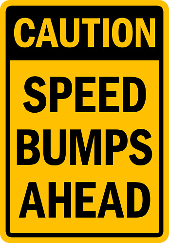 Caution speed bumps ahead sign. Traffic signs and symbols.