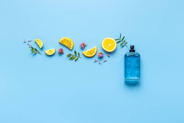 istock Perfume bottle flat lay with fragrance ingredients, top view 1328848045