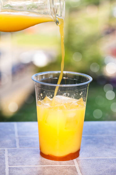istock Making Bumble coffee - refreshment summer iced cocktail with espresso, orange juice 1328850810