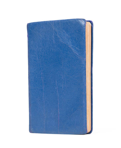 istock Small blue book, isolated on a white background 1328853706