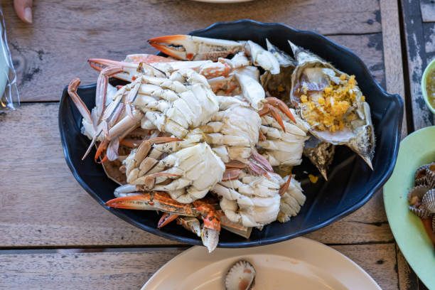 istock close up Fresh Streamed crab is ready to eat on the local restaurant  table. 1328855059