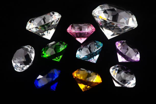 istock Colorful diamonds on black background 1328859312