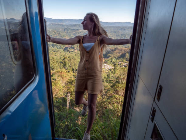 istock Tourist in Sri Lanka riding train 1328861525