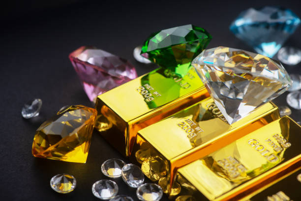 istock Wealth concept.Gold bars and diamonds 1328868455