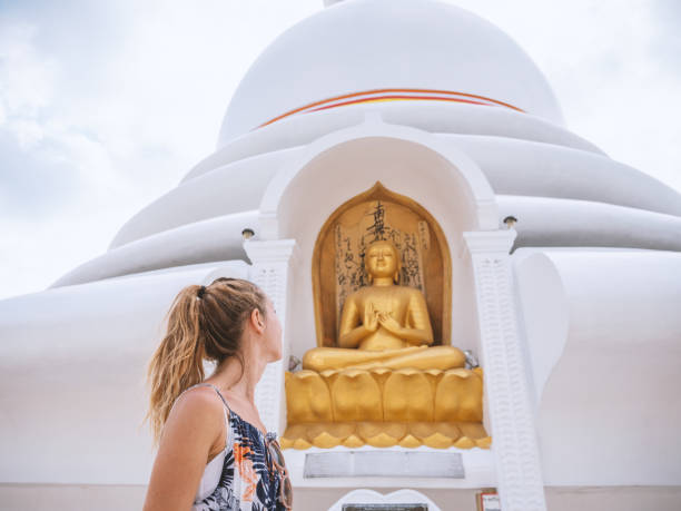 istock Woman visiting temple in Sri Lanka 1328871108
