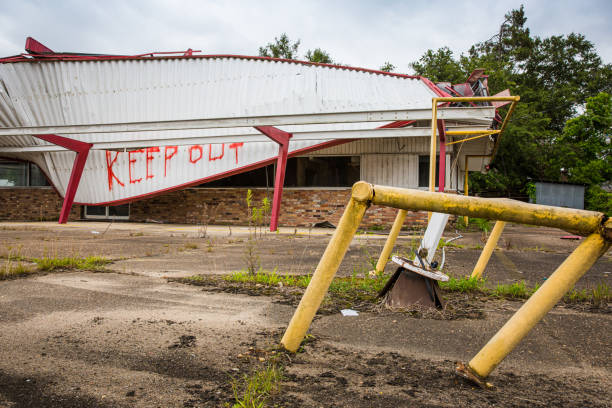 istock Building with Roof Collapsed and Keep Out Spray Painted 1328872137