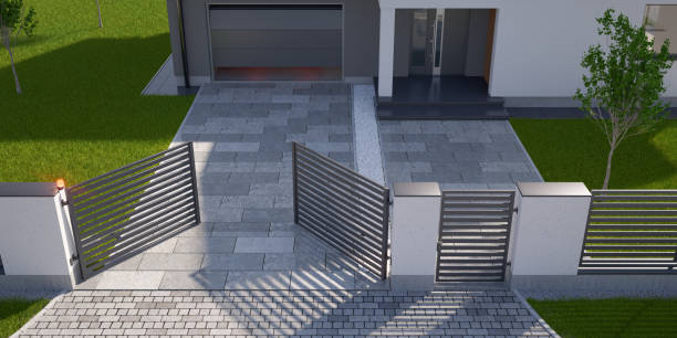 istock Automatic gate, fence, driveway and house with garage, 3d illustration 1328873437