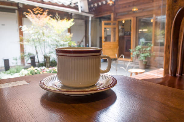 Cup of coffee on a wooden table
