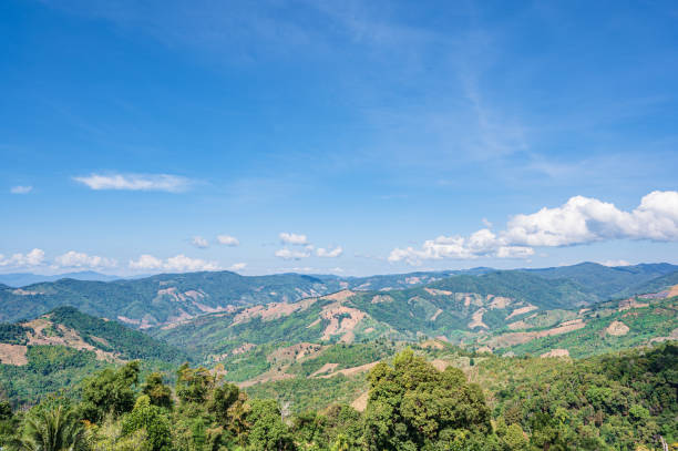 istock Beautiful mountain view and blue sky on doi sky at nan province. 1328875079