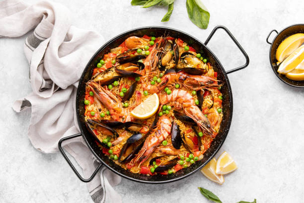 paella in a special pan, ready to eat, view from above - shrimp pan cooking prepared shrimp imagens e fotografias de stock