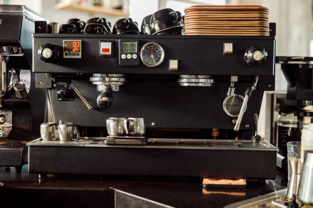 istock coffee making staff in cafe, espresso machine 1328876293