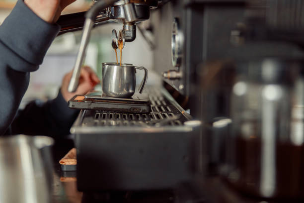 istock Happy smiling professional barista in cafe 1328876350