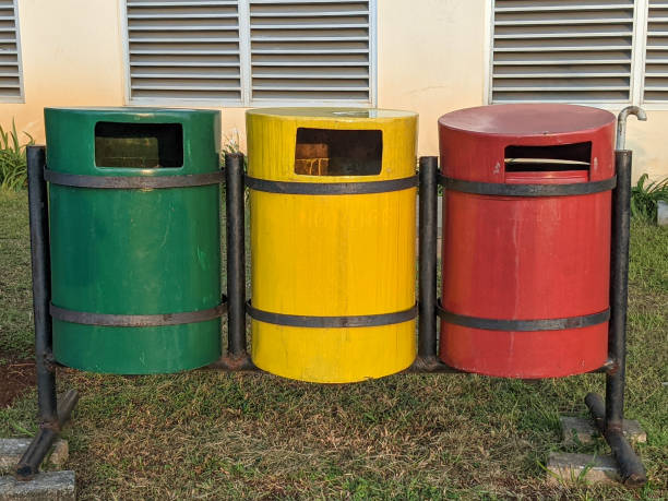 istock Trash Cans of three color 1328877748