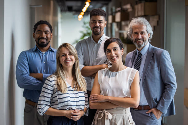 istock Successful business team smiling teamwork corporate office colleague 1328881558