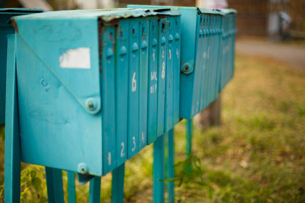istock old vertical metal mailboxes in the street 1328884729