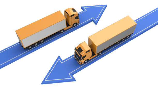 trucks go in different directions stock photo