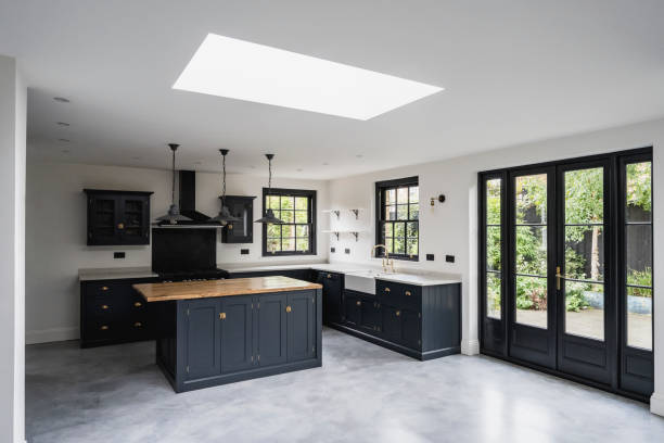 istock Modern domestic kitchen with skylight and outdoor access 1328886231