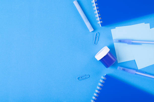 istock Back to school flat lay background on blue 1328887293