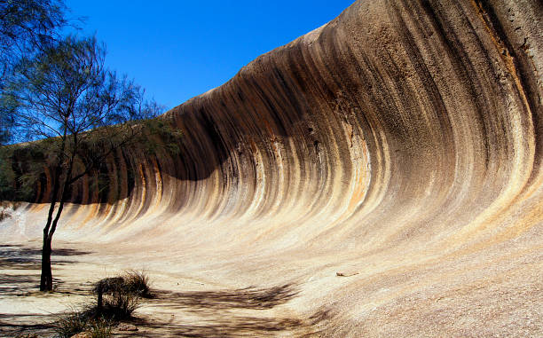 istock Natural Wonders - Wave Rock in Hyden - Australia 1328887589