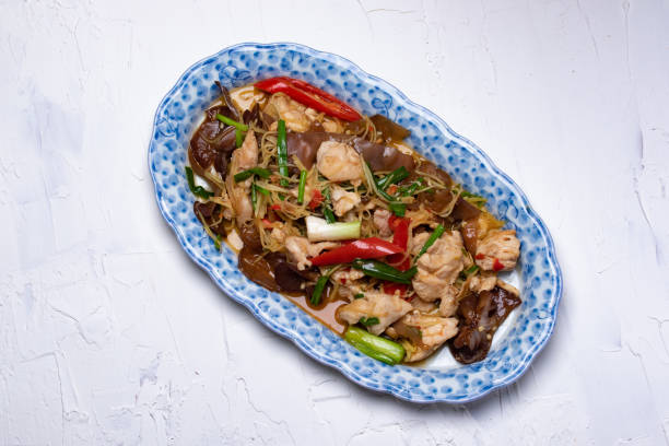 istock Close up.Stir-fried chicken with ginger and vegetables Thai food 1328888888