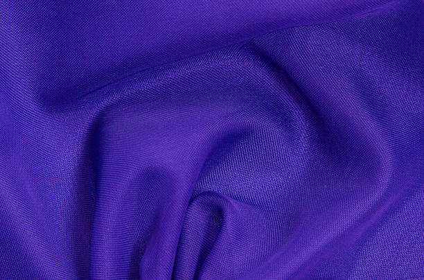 istock Purplel crumpled fabric background,light airy, transparent fabric texture. 1328898357