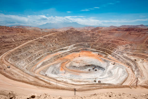 Open-pit copper mine View from above of the pit of an open-pit copper mine in Peru copper mine stock pictures, royalty-free photos & images
